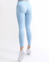 Colanți modelatori seamless fără cusături din colectia Original by GYMTUNED în albastru pastel – vedere din spate, cu talie înaltă și logo vizibil