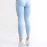 Colanți modelatori seamless fără cusături din colectia Original by GYMTUNED în albastru pastel – vedere din spate, cu talie înaltă și logo vizibil